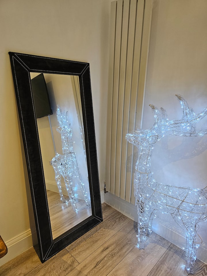 Decorative reindeer and mirror