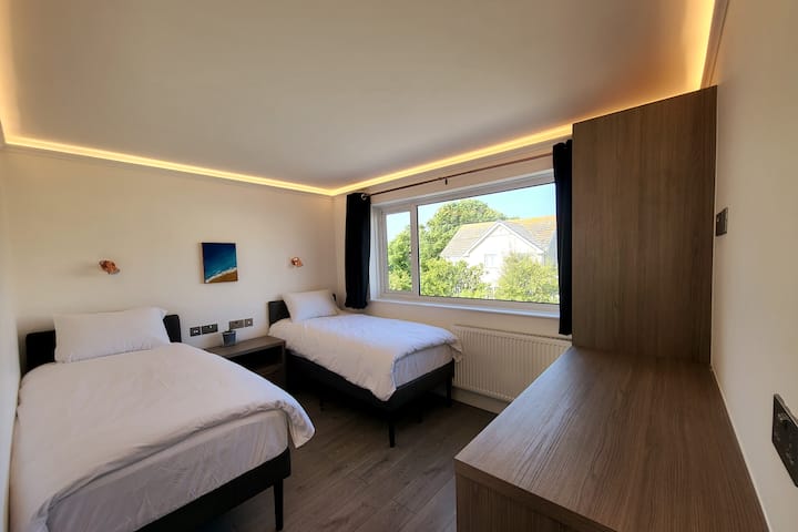 Cozy twin bedroom with window