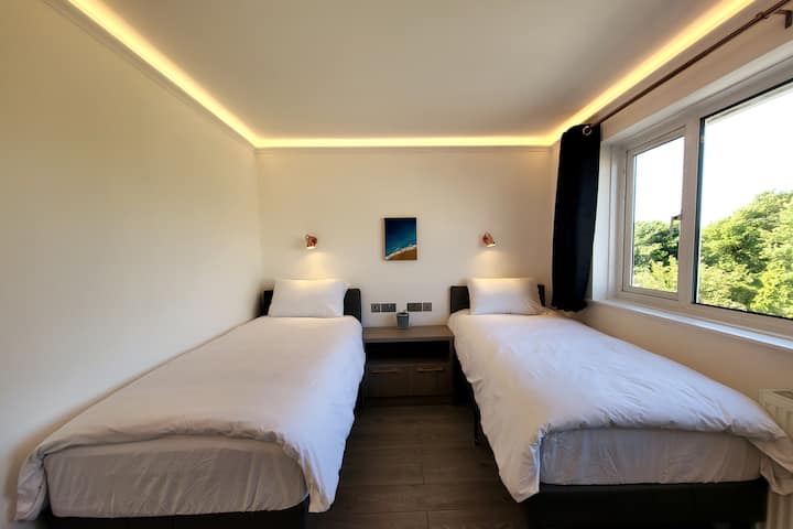 Cozy twin bedroom with window